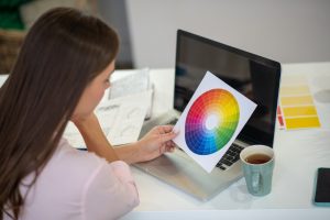 Close up of a color palette in female hands